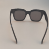 Black square frame eyeglasses with tinted lenses