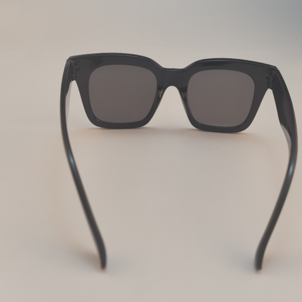 Black square frame eyeglasses with tinted lenses